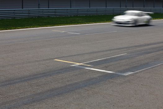 Race car passing finnish Line