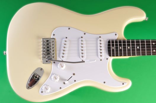 guitar body and neck against a chroma green screen