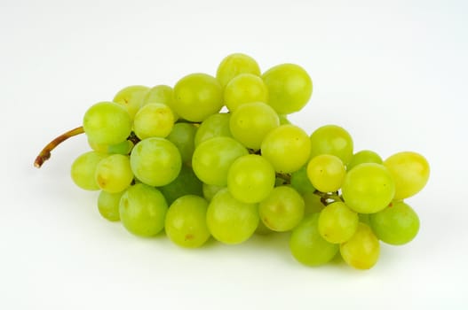 Green grapes isolated on white background.