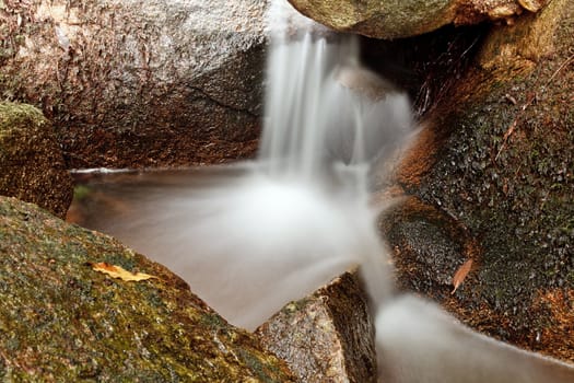 Small natural waterfall in the National Park Sintra-Cascais.