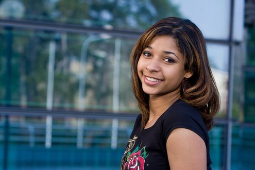 Very beautiful and pretty teenager with brown hair happy smiling