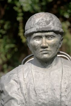 It is a man of Atayal tribe stone carving portrait in Taiwan.