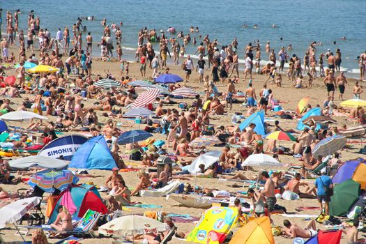 Crowded beach in summer at Scheveningen
