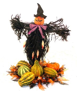 a scarecrow with seasonal foods