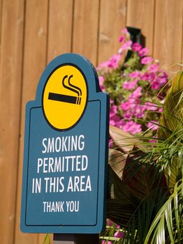 A sign for a smoking permitted area