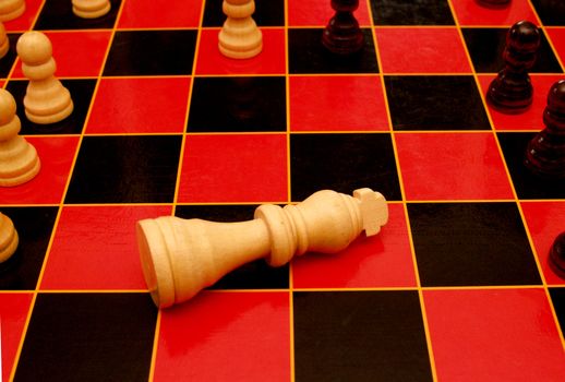 King piece on a chess board in the draw position.