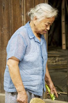 Image of an elderly Chinese lady at Daxu Ancient Town, Guilin, China.
