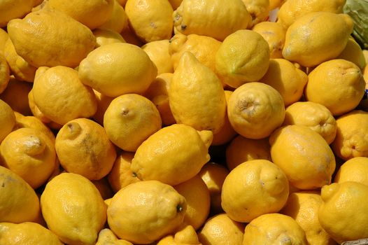 Fresh lemons at a market place.