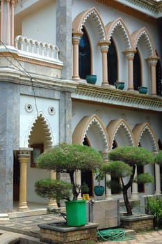 masjid wall covered by marble with arabic decorative style