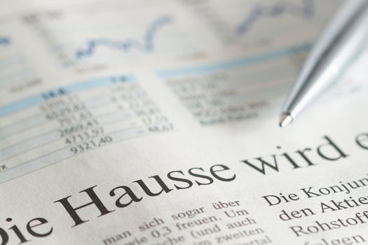 German newspaper close-up with the headline about stock hausse