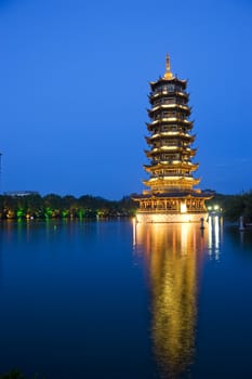 Night image of the Sun Pagoda at Guilin, China. This pagoda is one of the two pagodas located side by side which together are known as the Sun and Moon Pagodas of Guilin.