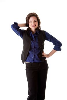 Beautiful young caucasian brunette business student woman standing with hand on hip and behind head smiling, wearing blue blouse and black jacket, isolated
