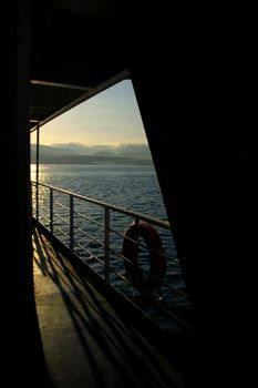 A view from a ferryboat with golden morning light