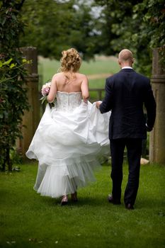 Bride and groom walking together 