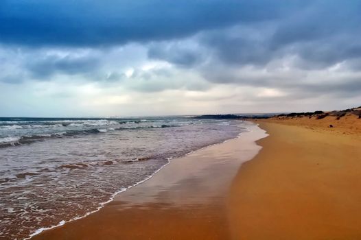 Rough sea with dramatic sky and light