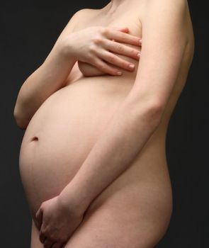 close up view of a pregnant woman's stomach