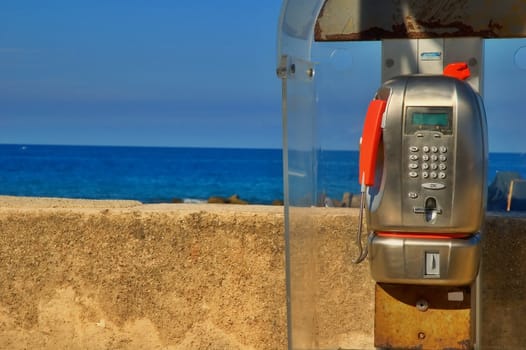 Public telephone overlooking the sea