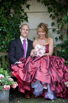 Pretty bride and groom enjoying a quiet moment together