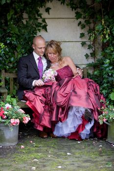 Pretty bride and groom relaxing on a hectic day