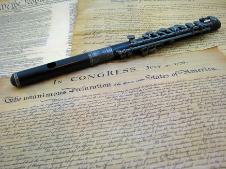 The US Declaration of Independence with an antique piccolo (fife).