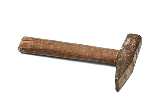 Old and rusty hammer on a white background