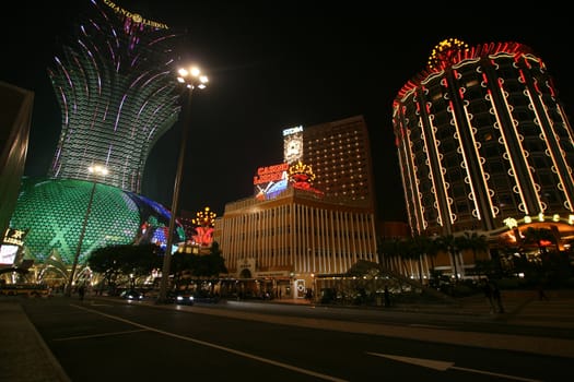 The Grand Hotel Lisboa and the old Lisboa Hotel side by side. Popular gambling and tourist attractions by Chinese visitors to Macau. 