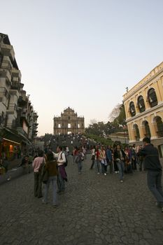 The famous ruins of St. Pauls Cathedral in Macau, a popular tourist attraction and a reminiscence of the old Portugese colonial rule.