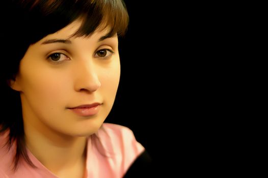 young casual woman in a black background