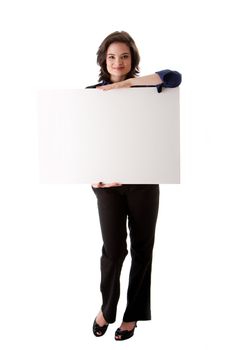 Beautiful young caucasian brunette business student woman standing holding a white blank board, isolated