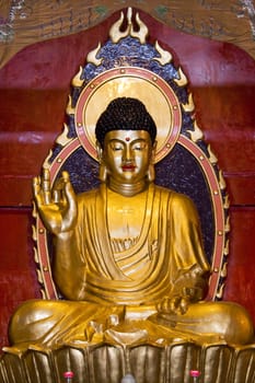 Image of a Buddha statue at Jian Zhen Temple, Yangshuo, Guilin, China.