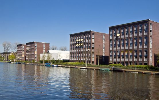 Modern architecture in Amsterdam. Modern houses in the new district of Amsterdam in the channel.