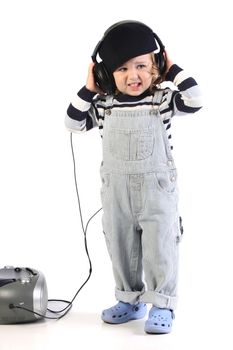 beauty a little girl listening music with portable CD radio