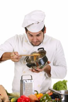 young chef preparing lunch on white background