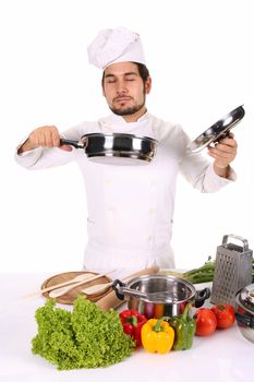 young chef smelling the aroma delicious food