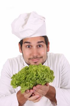 chef smelling the aroma of fresh salad