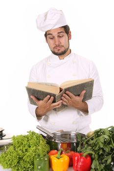 young chef preparing lunch on white background