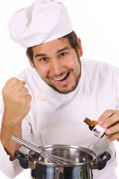 young chef preparing lunch with poison bottle