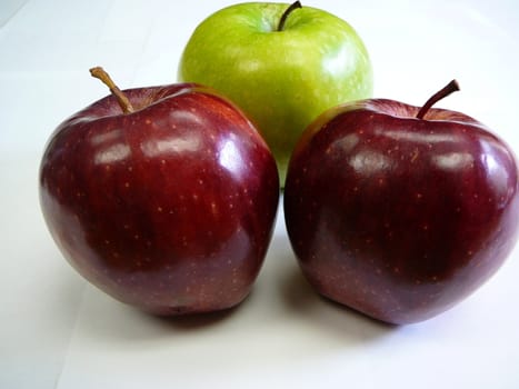 three apples isolated on white background