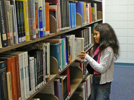 Girl Looking for a library book