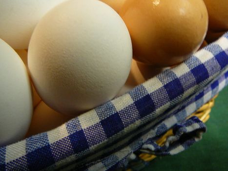 Basket of brown and white eggs