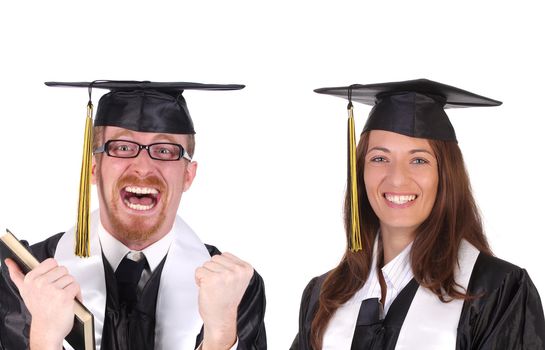 two successful student in graduation gowns on white background