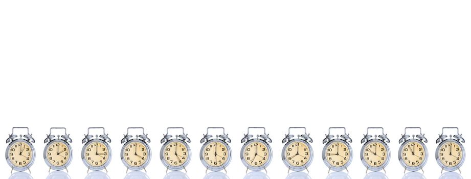 group of alarm clock with times 12 clock on white background