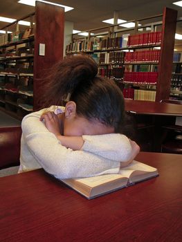 Student studying at the library