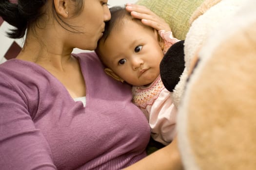 a mother expressing her love to her 10 months old baby girl