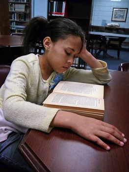 Student studying at the library