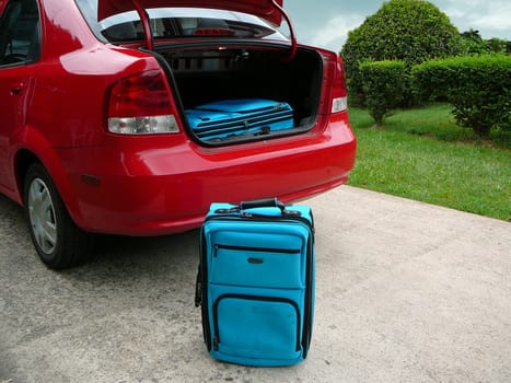 Luggage Beside Trunk