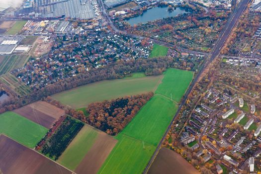 Aerial view of suburban area Dusseldorf, Germany, Europe, with mixed residential, industrial and agricultural zones.