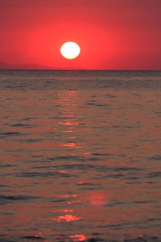 details of ocean and sunrise in Greece