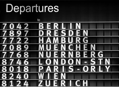 Airport departures information board - air travel background