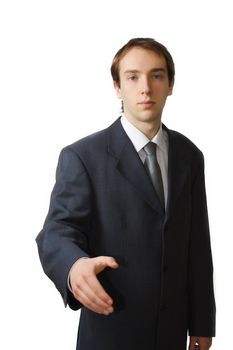 Young business man approaching for a hand shake, isolated over white